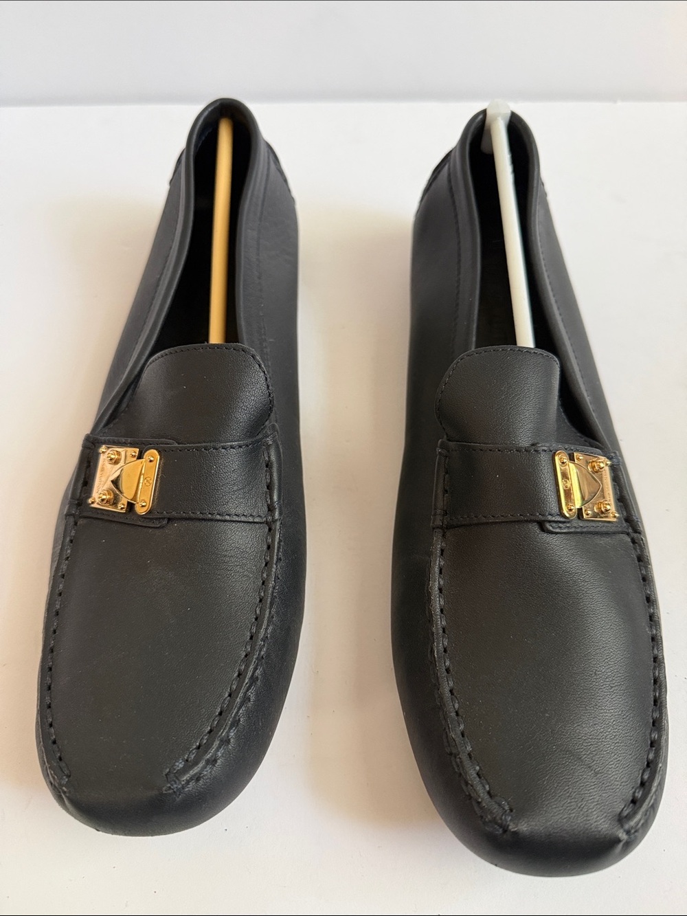 Louis Vuitton Soft Navy Leather Loafers with LV-Stamped Gold Accent and Heel